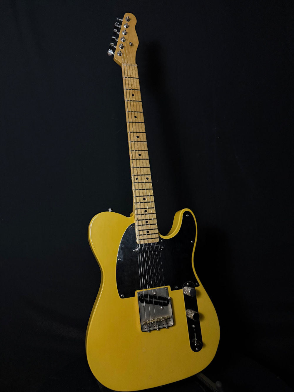 Maness Parts Telecaster with yellow body and maple neck and fretboard