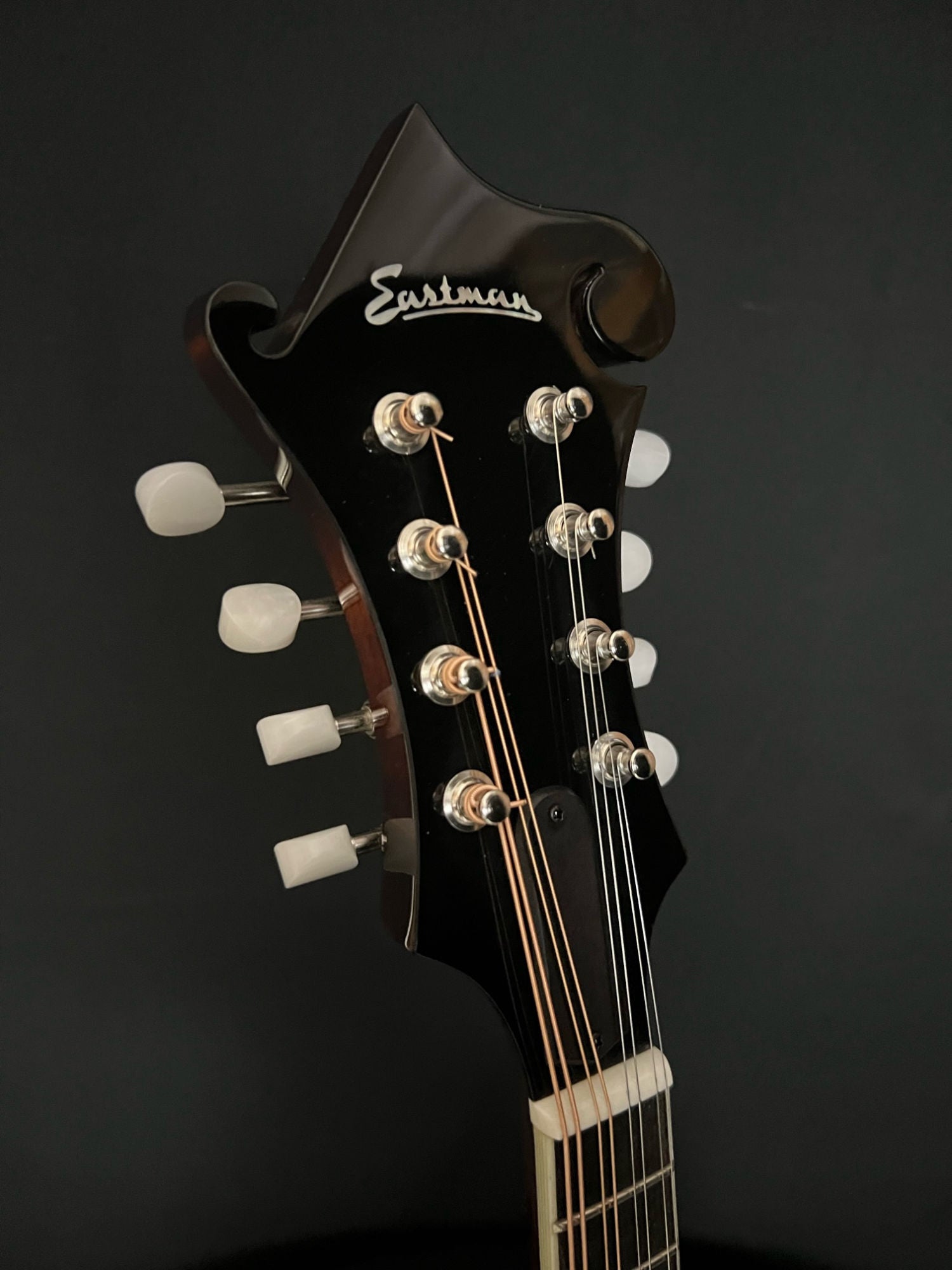 close up of Eastman MD515 F-style mandolin headstock